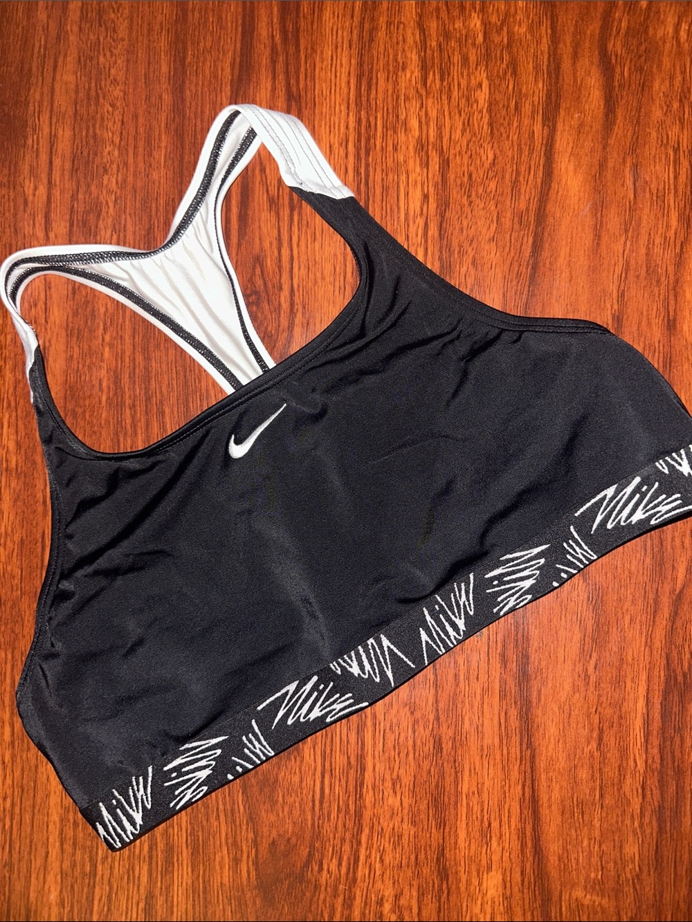 Girls Nike Black Sports Bra with Whote Accent and Patterned Band